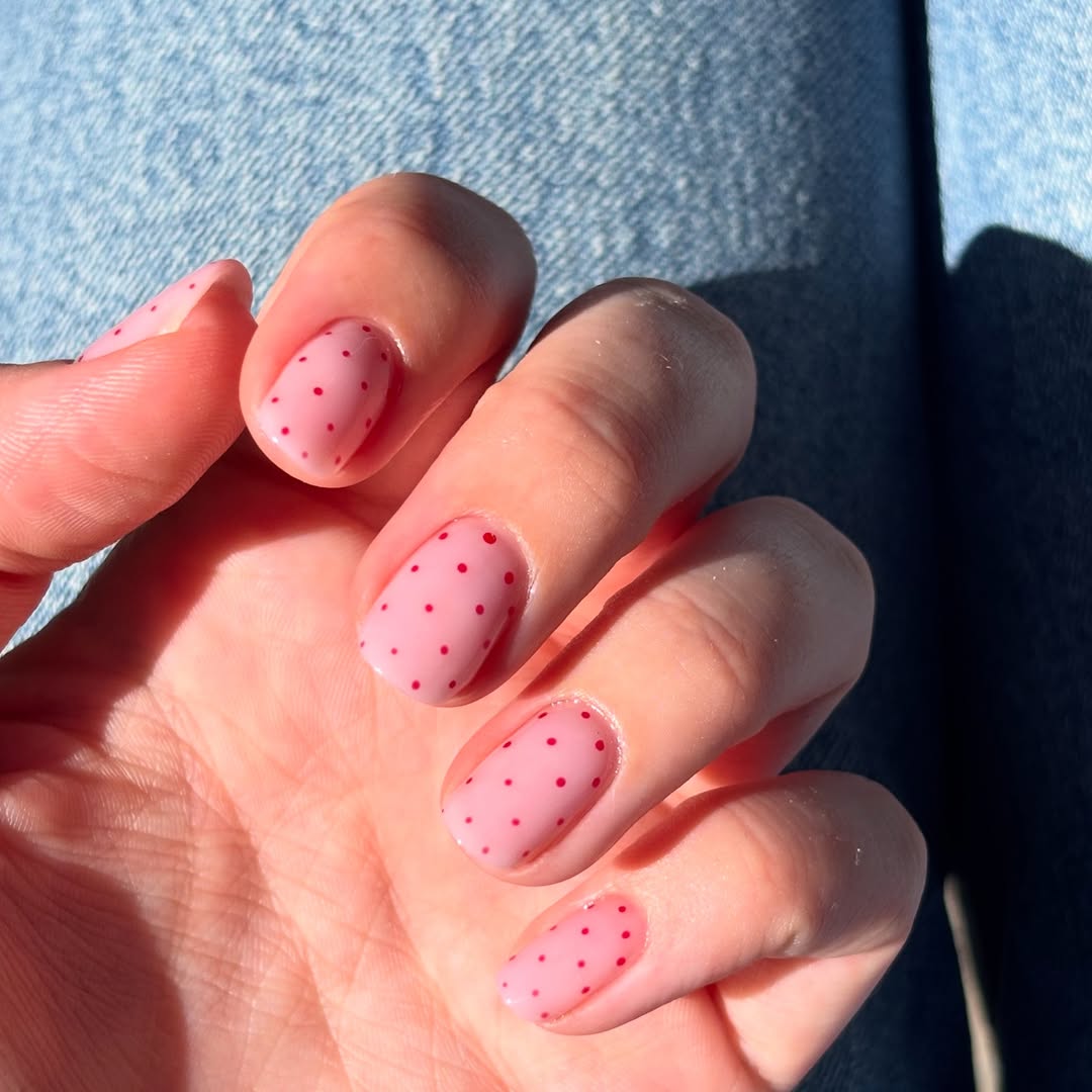 Pink polka dot nail art design