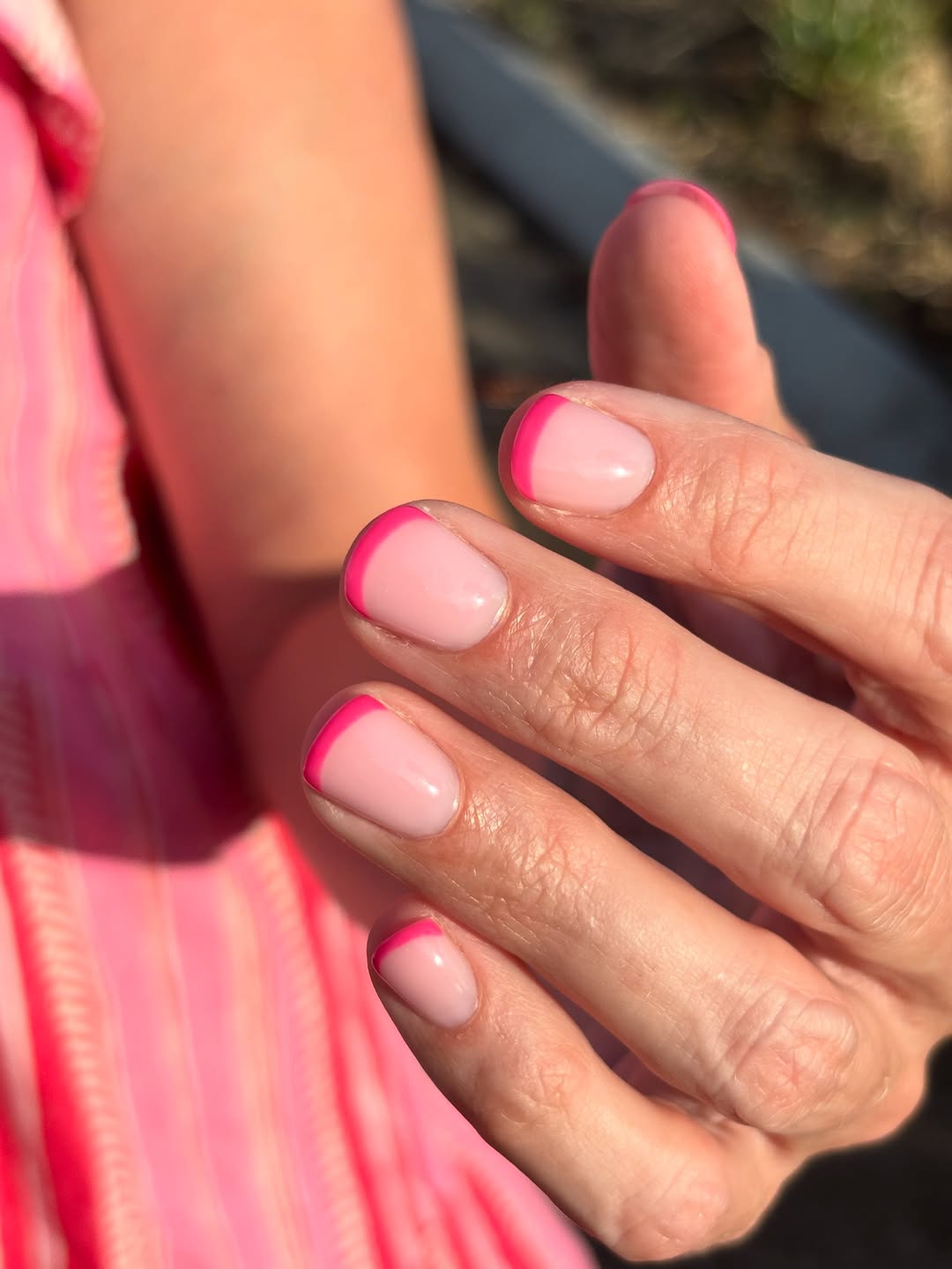 Hot pink French tip manicure