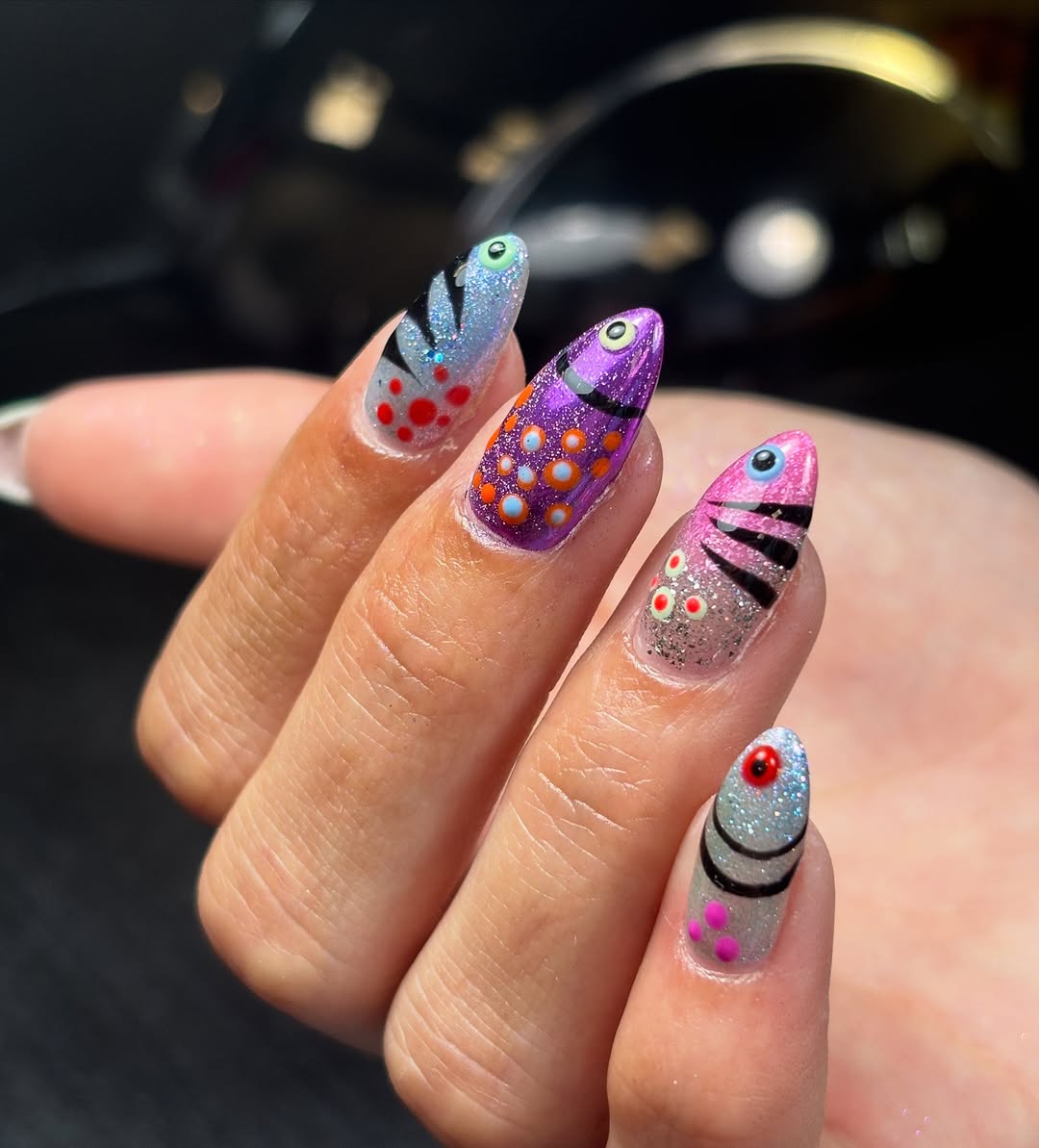 Colourful artistic fish nail design